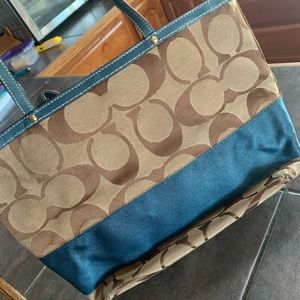 Coach bag with teal stripe